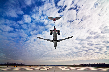 A commuter jet lands at St. Louis-Lambert International Airport in St. Louis, Mo.